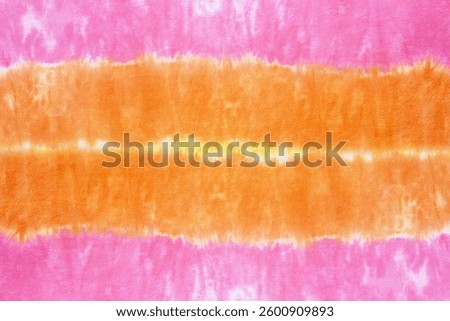 colourful tie dye pattern hand dyed on cotton fabric abstract texture background.