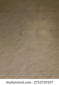 Commercial tile flooring pattern with worn linoleum surface texture in indoor building interior.