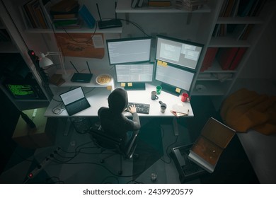 A committed programmer is deeply focused on coding at a multi-monitor setup, surrounded by essential technology and coding literature, showcasing dedication and a high degree of professionalism.