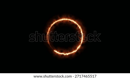 A complete circle formed by intense orange and yellow fire burns brightly with visible flames and wisps of smoke against a pure black background.