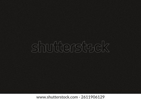 A completely black image displaying absolute darkness with no visible features or discernible shapes present