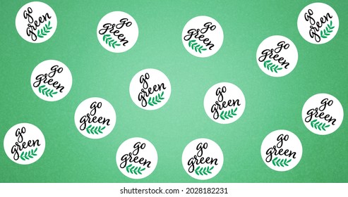 Composition of go green text and leaf logos repeated over green background. global conservation and earth day concept digitally generated image.