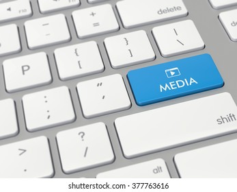 Computer key showing the word media with icon