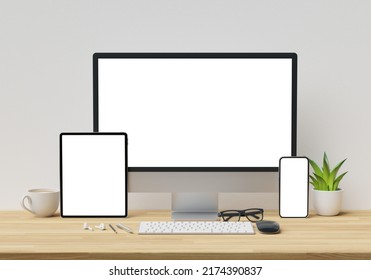 Computer tablet and smartphone with blank screen on wood office desk. 3d rendering.