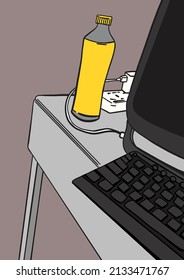 Computer and water bottle on table.