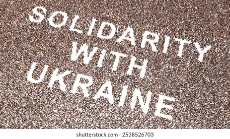 Concept conceptual large community of people forming SOLIDARITY WITH UKRAINE message . 3d illustration metaphor for solidarity, cooperation, compassion, kindness,  unity, inspirational, altruism, help - Powered by Shutterstock