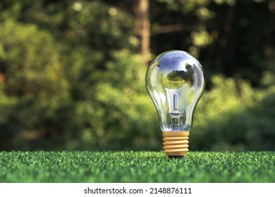 The concept of an eco-friendly energy source. Light bulb on the grass. 3d render..