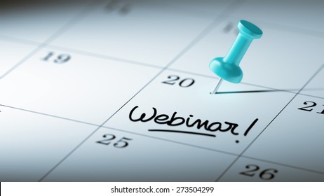 Concept image of a Calendar with a blue push pin. Closeup shot of a thumbtack attached. The words Webinar written on a white notebook to remind you an important appointment. - Powered by Shutterstock