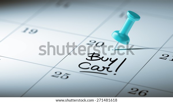 Concept image of\
a Calendar with a blue push pin. Closeup shot of a thumbtack\
attached. The words Buy Car written on a white notebook to remind\
you an important\
appointment.