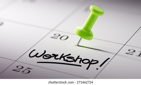 Concept image of a Calendar with a green push pin. Closeup shot of a thumbtack attached. The words Workshop written on a white notebook to remind you an important appointment. - Powered by Shutterstock