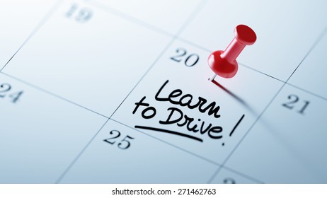 Concept image of a Calendar with a red push pin. Closeup shot of a thumbtack attached. The words Learn to Drive written on a white notebook to remind you an important appointment. - Powered by Shutterstock