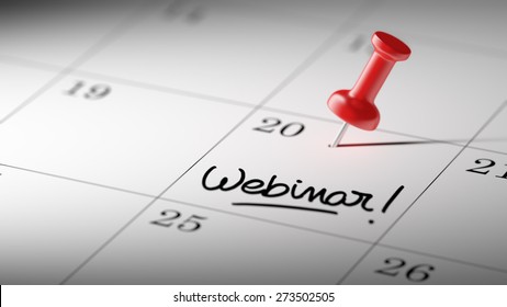 Concept image of a Calendar with a red push pin. Closeup shot of a thumbtack attached. The words Webinar written on a white notebook to remind you an important appointment. - Powered by Shutterstock