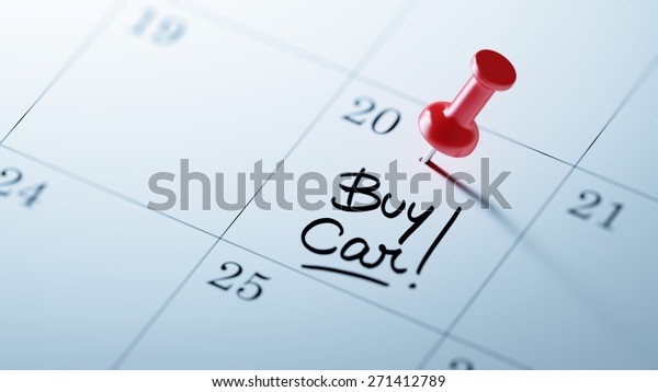Concept image of\
a Calendar with a red push pin. Closeup shot of a thumbtack\
attached. The words Buy Car written on a white notebook to remind\
you an important\
appointment.