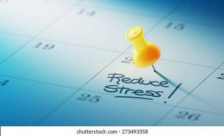 Concept image of a Calendar with a yellow push pin. Closeup shot of a thumbtack attached. The words Reduce Stress written on a white notebook to remind you an important appointment.