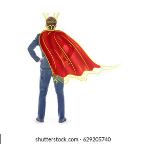 The Concept Of Narcissism. A Man In An Imaginary Crown And Cloak Isolated On A White Background. The Concept Of Egocentrism.