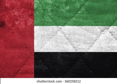 The Concept Of National Flag On Stitched Canvas Background: UAE