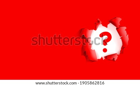 The concept of question marks. Torn red paper with a red question mark