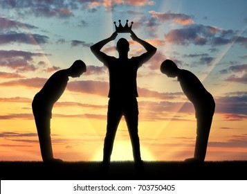 Concept Of Selfishness And Narcissistic. Silhouette Of A Selfish Man Dresses His Crown, And Servants Bow To Him