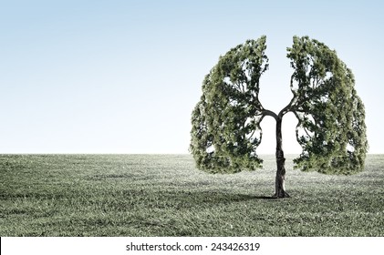 Conceptual image of green tree shaped like human lungs