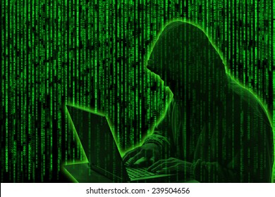 Conceptual image of a hacker on matrix background of falling green computer code digits