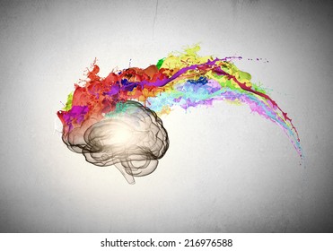 Conceptual image of human brain in colorful splashes