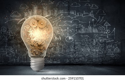 Conceptual image with light bulb and gears inside - Powered by Shutterstock