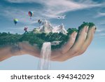Conceptual image of a mountain landscape held by a hand, flowing water cascading and tourist hiking . Ecology concept. This is a 3d render illustration