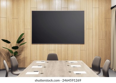 Conference room with large blank screen on wooden wall, modern furniture, concept of business meeting space. 3D Rendering - Powered by Shutterstock