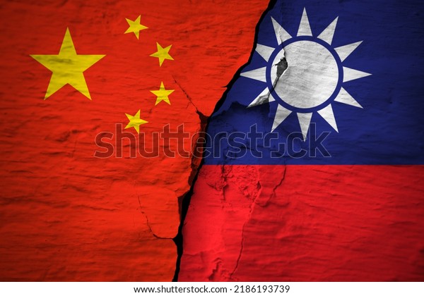 Conflict between countries. China and\
Taiwan flags on the cracked concrete wall. The deterioration of\
diplomatic relations. Conflict and crisis concept\
.
