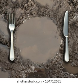 Contaminated food danger concept and global poverty symbol as a wet ground with a mud puddle of dirty water with sky refection shaped as a dinner plate with a silver fork and knife.