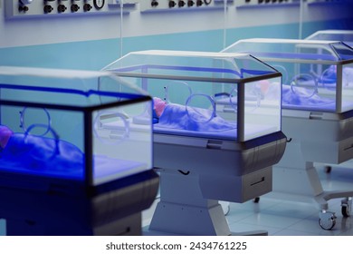 A contemporary, hygienic NICU equipped with state-of-the-art incubators safeguarding the health of vulnerable newborns with attentive medical supervision. - Powered by Shutterstock