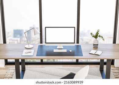 Contemporary Office Interior With Book Shelves, Furniture, Panoramic City View And Empty White Mock Up Computer Screen. Creative Designer Desktop Concept. 3D Rendering