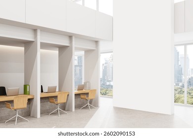 Contemporary office space featuring a blank wall for mockup, wooden desks with laptops, and cityscape view through large windows. Clean and minimal layout. 3D Rendering.