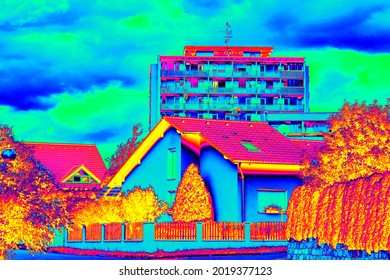 Contrast Of Family House And High Flat House. Thermal Image Heat Loss At The Residential Building.