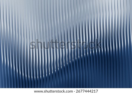 Cool blue abstract background featuring a ribbed vertical texture with subtle light play, creating a serene and sophisticated atmosphere