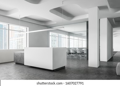 Corner Of Futuristic Office With White Walls, Concrete Floor, White And Stone Reception Counter And Glass Wall Meeting Room In Background. 3d Rendering