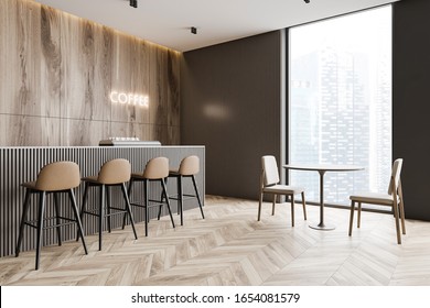 Corner Of Minimalistic Coffee Shop With Wooden And Grey Walls, Wooden Floor, Bar Counter With Brown Stools And Glowing Coffee Sign And Round Table With Chairs. 3d Rendering