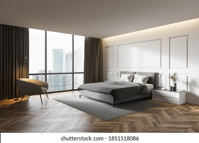 Corner of modern master bedroom with white walls, wooden floor, comfortable king size bed and armchair. 3d rendering