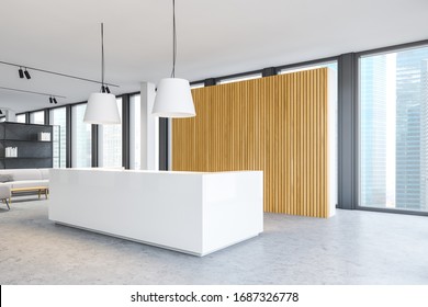 Corner of modern minimalistic office with white and wooden walls, concrete floor and comfortable reception desk standing near window with blurry cityscape. Sofa in waiting room. 3d rendering