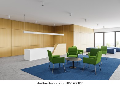 Corner Of Modern Office Waiting Room With White And Wooden Walls, Concrete Floor, Reception Desk And Green Armchairs. 3d Rendering