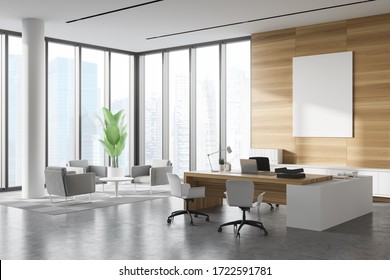 Corner of panoramic CEO office with white and wooden walls, wooden computer desk, vertical mock up poster and lounge area with armchairs. Windows with blurry tropical view. 3d rendering