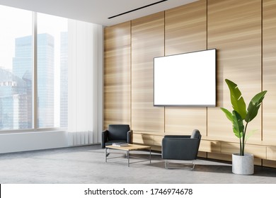 Corner Of Panoramic Corporate Office Waiting Room With White And Wooden Walls, Concrete Floor, Two Comfortable Gray Armchairs And TV With Mock Up Screen. Blurry Cityscape. 3d Rendering