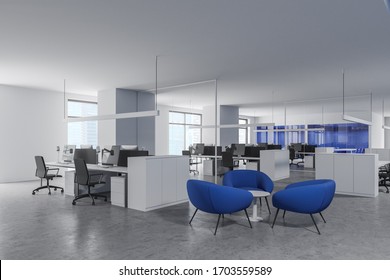 Corner Of Stylish Open Space Office With Wthie And Blue Walls, Concrete Floor, Rows Of White Computer Tables And Lounge Area With Blue Armchairs. 3d Rendering