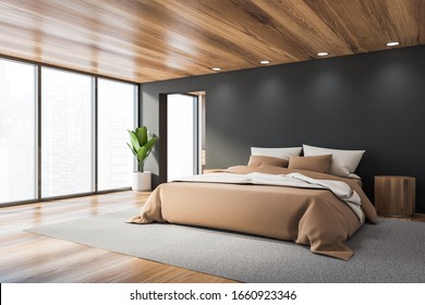 Corner Of Stylish Panoramic Bedroom With Grey Walls, Wooden Floor And Ceiling, Cozy King Size Bed With Beige Blanket And Two Round Bedside Tables. Blurry Cityscape. 3d Rendering