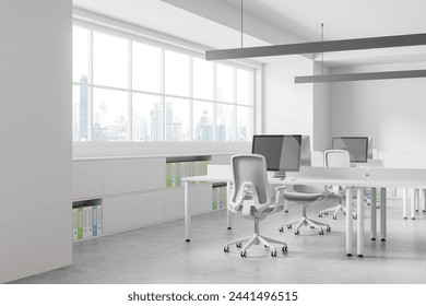 Corner view of office interior with pc computers on desk and chairs, light concrete floor. Stylish coworking zone with panoramic window on Bangkok skyscrapers. 3D rendering