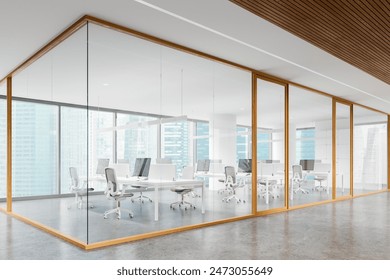 Corner view of office interior with pc computers on white desks with divider, concrete floor. Glass coworking space with panoramic window on Singapore skyscrapers. 3D rendering