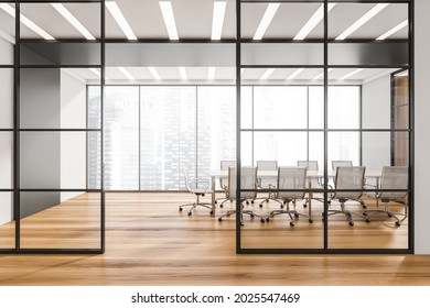 Corridor With Half Empty Panoramic Conference Room Behind The Black Framed Glass Wall Partitions. Wooden Floor. A Concept Of Modern Office Building. 3d Rendering