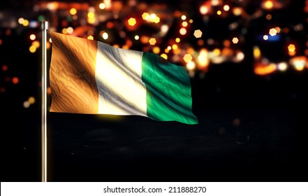 Cote D'Ivoire National Flag City Light Night Bokeh Background 3D