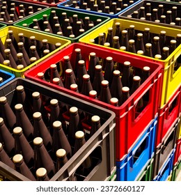 Countless colorful beer crates stacked in an outdoor warehouse on a sunny day seen from a top view. Fresh beverage storage. Crates are neatly stacked in an open-air storage. - Powered by Shutterstock