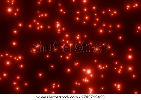 Countless red particles floating on a black background